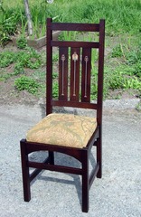 Single chair in darker stain.